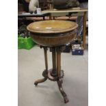 Unusual Victorian Walnut Circular Table, the hinged lid revealing a Tea Caddy Section fitted with