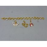A Swarovski key ring of butterfly, love heart and ladybird, along with a bracelet