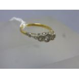 An 18ct gold and diamond ring