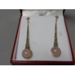 A pair of silver marcasite and rose quartz art deco style earrings