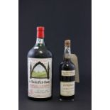 A large 3 litre bottle of French red wine, along with a bottle of Cordial by Caters of Bath