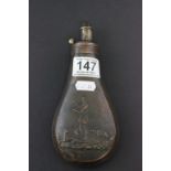 Antique shot flask decorated with hunter & dogs