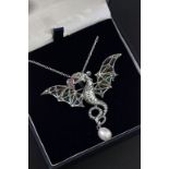 Silver plique a jour pendant necklace in the form of a Welsh dragon