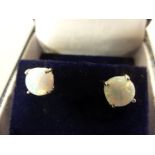 Pair of silver and opal stud earrings