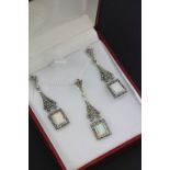 Suite of silver jewellery to include a marcasite and opal pendant and matching earrings