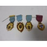 Four Gilt Metal and Enamelled Masonic Medals with Ribbons