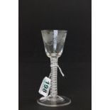 An 18th century opaque twist wine glass, with a bell bowl (a/f)