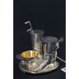 Silver plated jockey themed egg cup and cruet set