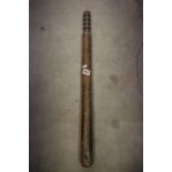 Military antique long truncheon or night stick stamped RM with crow foot mark