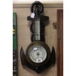 Wooden barometer with nautical theme