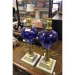 Pair of Gilt Metal and Marble Table Lamps with Blue Star Cut Glass Wells