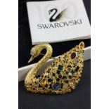 A Swarovski swan brooch, boxed