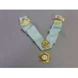 R.A.O.B Gilt Metal Medal awarded to Brother A Hopping of the Coronation Lodge with two roll of