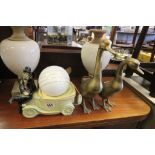 A 20th century lamp in the form of a car and Charile Chaplin plus Two Brass Ducks