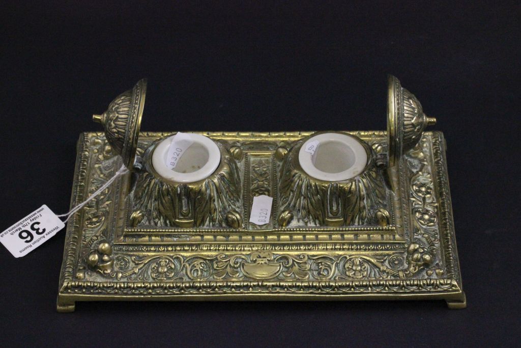 A Victorian double brass inkwell