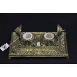 A Victorian double brass inkwell