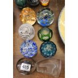 Eight Glass Paperweights including Bertil Vallien and Orrefors,