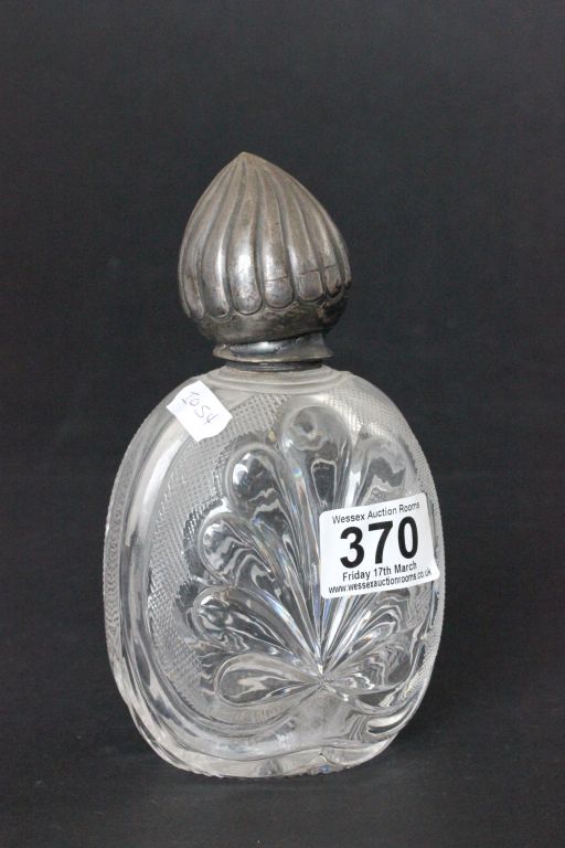 White metal topped cut glass scent bottle