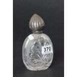 White metal topped cut glass scent bottle