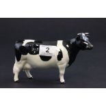 A Beswick model of friesian cow