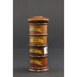 A fruitwood four section Victorian style spice tower