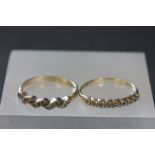 Two 9ct gold diamond chip set rings