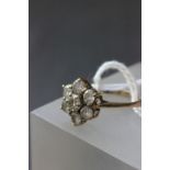 Ladies 9ct gold flower design 7 stone dress ring