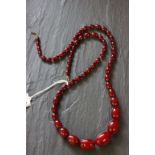 Cherry amber bakelite necklace