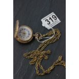 14ct Gold Waltham Hunter pocket watch on yellow metal chain