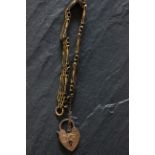 9ct gold gate bracelet with rose gold heart padlock clasp
