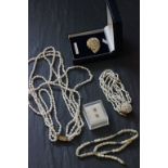 Two freshwater pearl necklaces plus a hedgehog brooch a pair of 9ct gold earrings