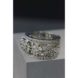 Impressive 18ct white gold & diamond ring with floral design