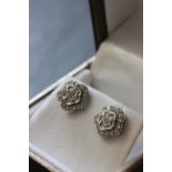 Pair of 9 white gold & diamond earrings