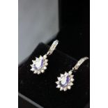 Pair of 14ct tanzanite and diamond pear shaped drop earrings