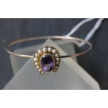 Victorian gold bangle with amethyst & pearl horseshoe to centre which unscrews to fit on hat pin