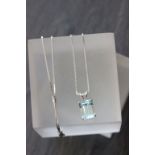 Fine 14k white gold necklace with topaz pendant