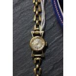 Ladies 14ct gold Longines wrist watch and strap with original box