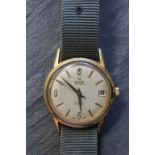 Gents 21 jewel Roamer Rotodate automatic wrist watch with gold plated bezel and stainless steel back