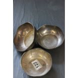 Three Indian silver bowls with engraving to base, each stamped "Silver" to the base