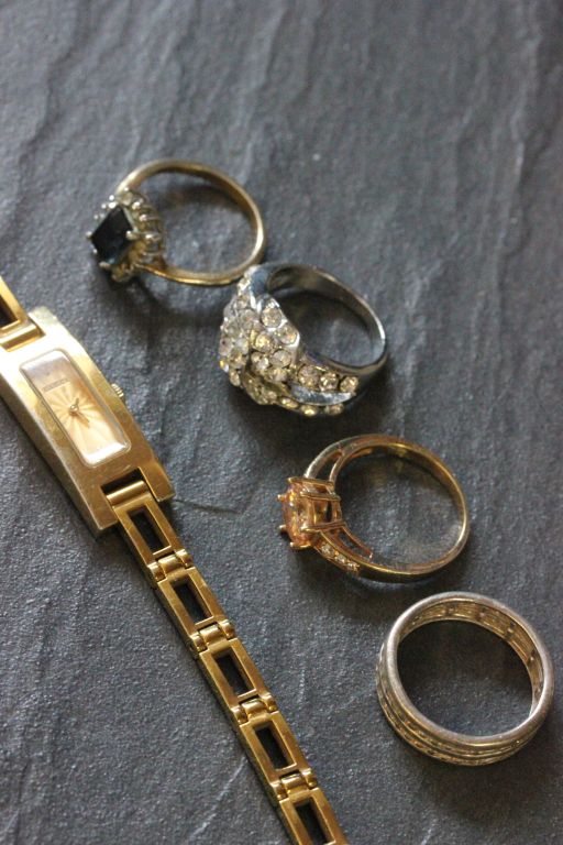 Four vintage dress rings including silver plus a ladies Gucci watch