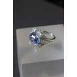 Platinum set substantial tanzanite and diamond ring the central stone of approx 5ct's with baguette