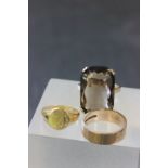 Three vintage 9ct gold rings including a Smoky Quartz dress ring