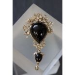 Fine 18ct yellow gold diamond and cabochon garnet brooch / pendant