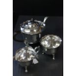 A silver plated three piece tea set, retailed by Mappin & Webb