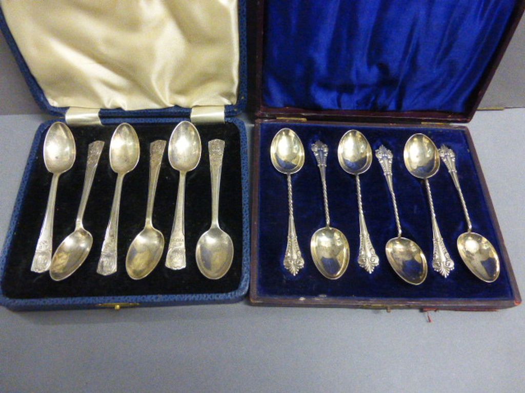 A set of silver teaspoons, Sheffield 1936, along with one other set of silver teaspoons
