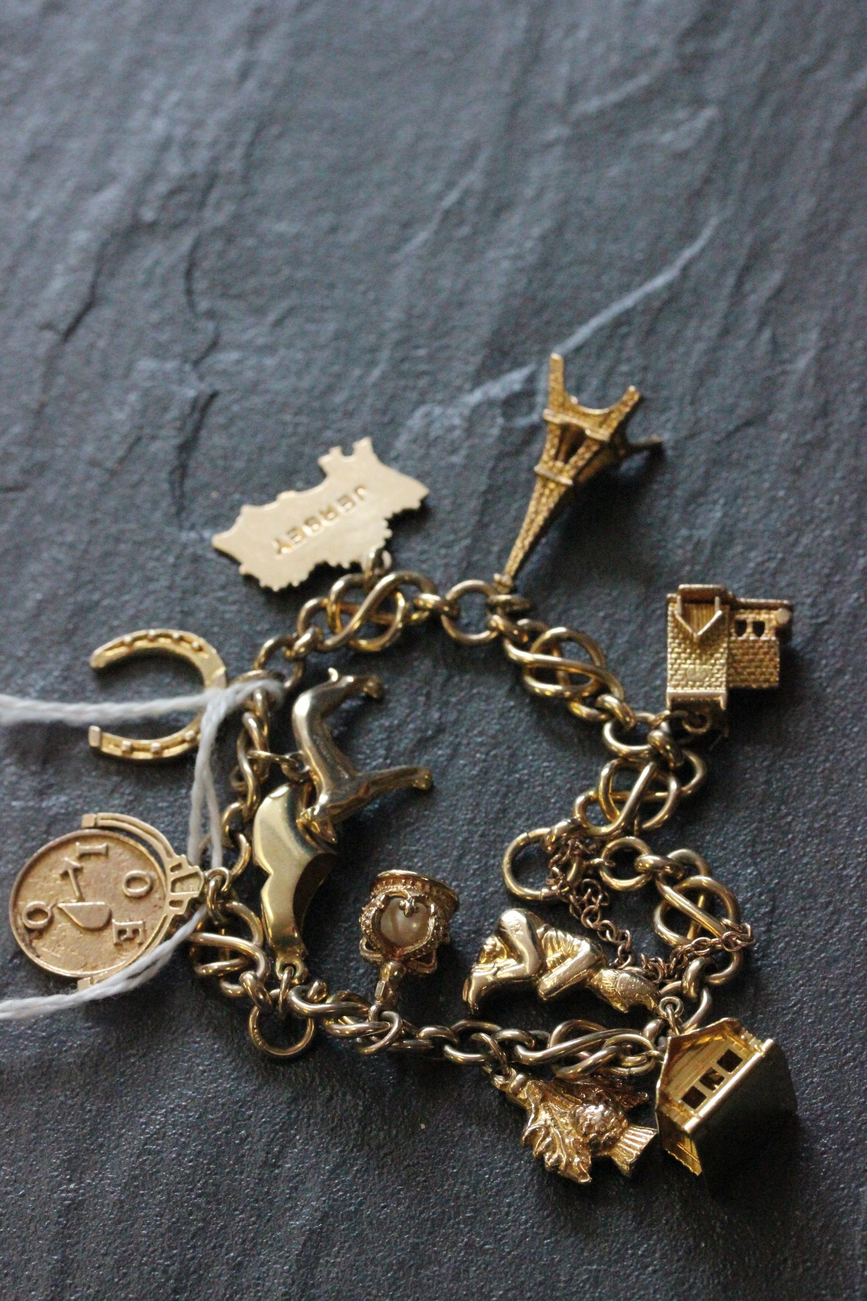 9ct gold charm bracelet with charms