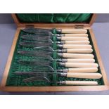 A cased set of silver 6 fish knives and 6 fish forks, each with a bone handle, in a fitted