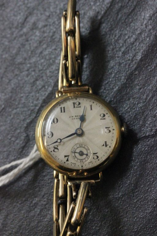 Boxed 15 jewel patent 18ct gold J.W.Benson wrist watch with 9ct gold strap