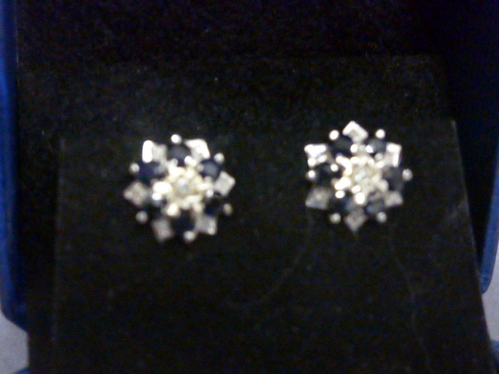 Pair of white gold sapphire and diamond earrings