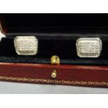 Fine pair of 18ct white gold diamond cuff links of 1.5ct's approx